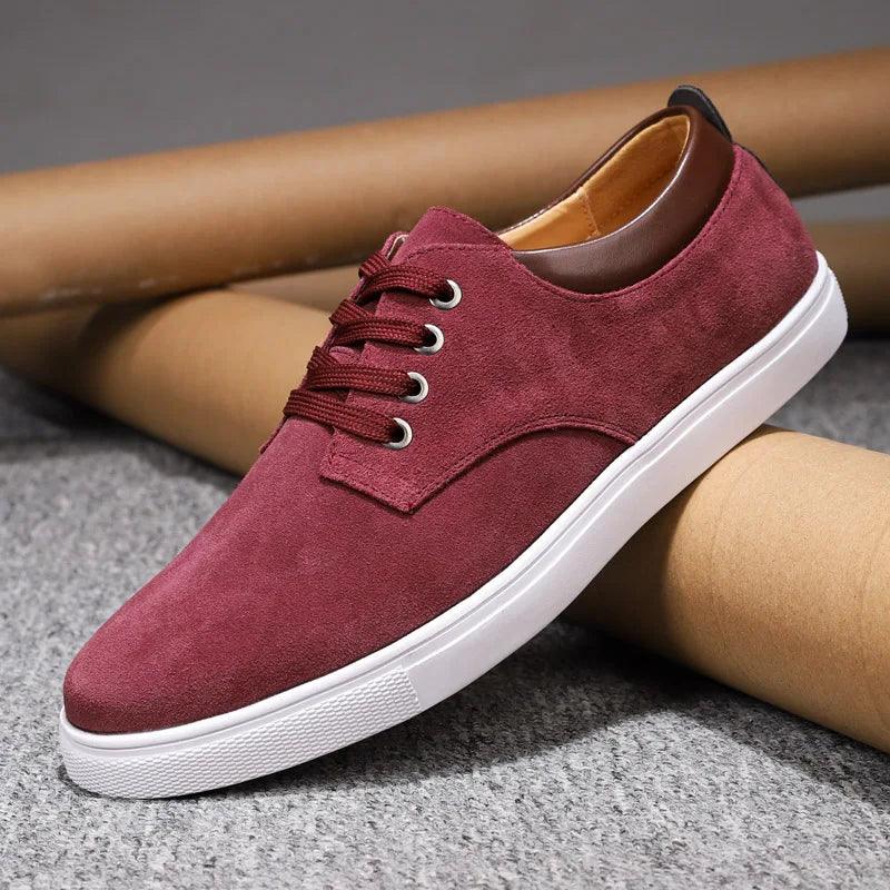 Pair of men's durable casual sneakers, offering all-day comfort and enduring style for versatile wear.