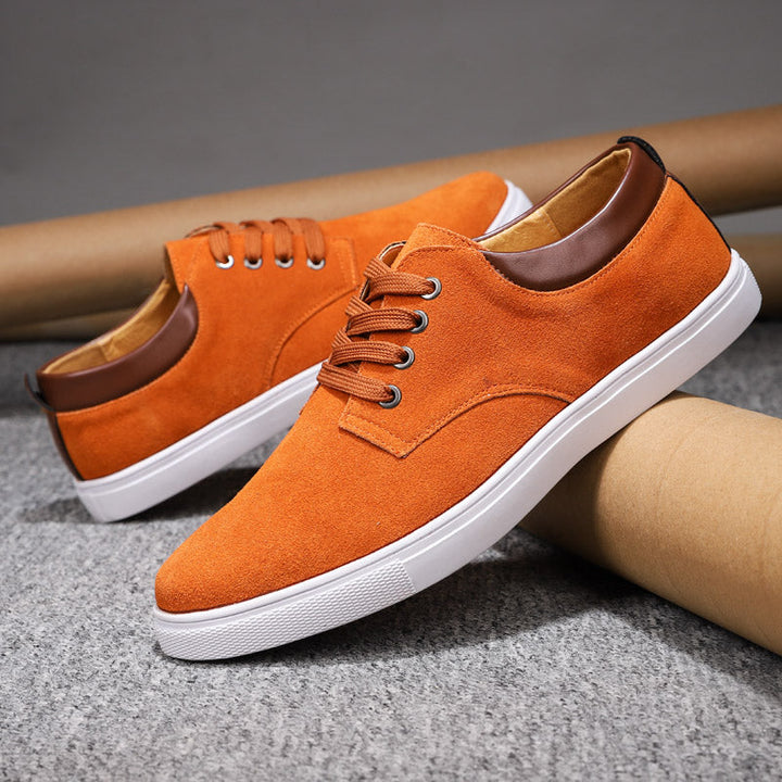Men's casual sneakers paired with jeans, showcasing versatile style, everyday comfort, and men's fashion.