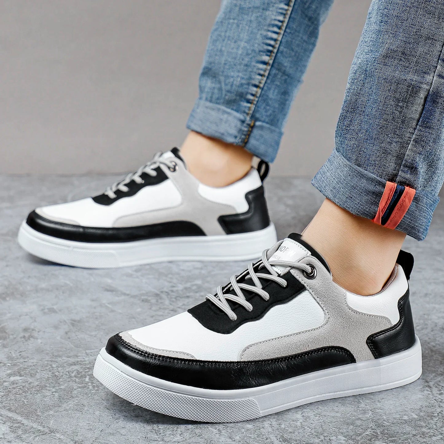 Black men's casual shoes, featuring sleek suede accents & durable lace-up design for everyday stylish comfort.