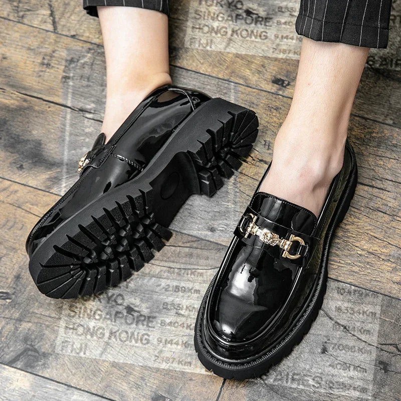 Stylish men's bold chain loafers with a distinctive gold accent and robust lug sole, ideal for fashion-forward men.