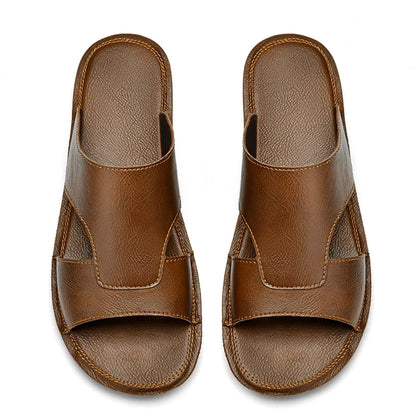 Stylish men's Cavrik slip-on sandals offering easy wear, comfort & a modern look for any occasion.