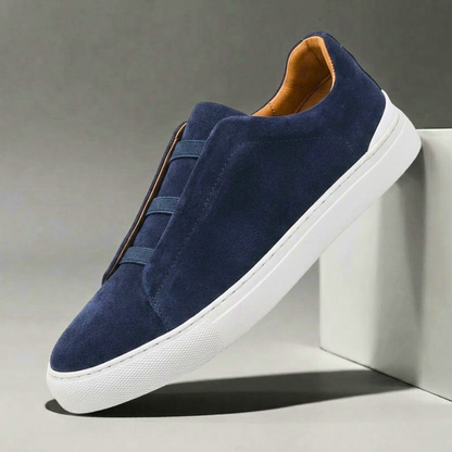 Men's Chelsea style slip-on sneakers in black. Comfortable fashion lifestyle footwear for everyday wear.