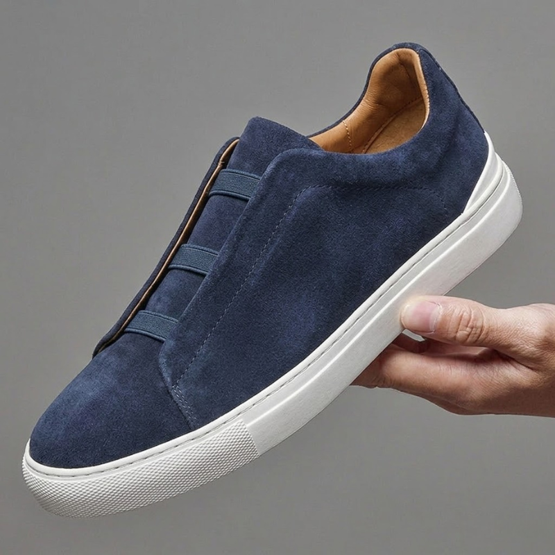 Stylish men's slip-on Chelsea sneakers, ideal fashion footwear for a modern casual look.