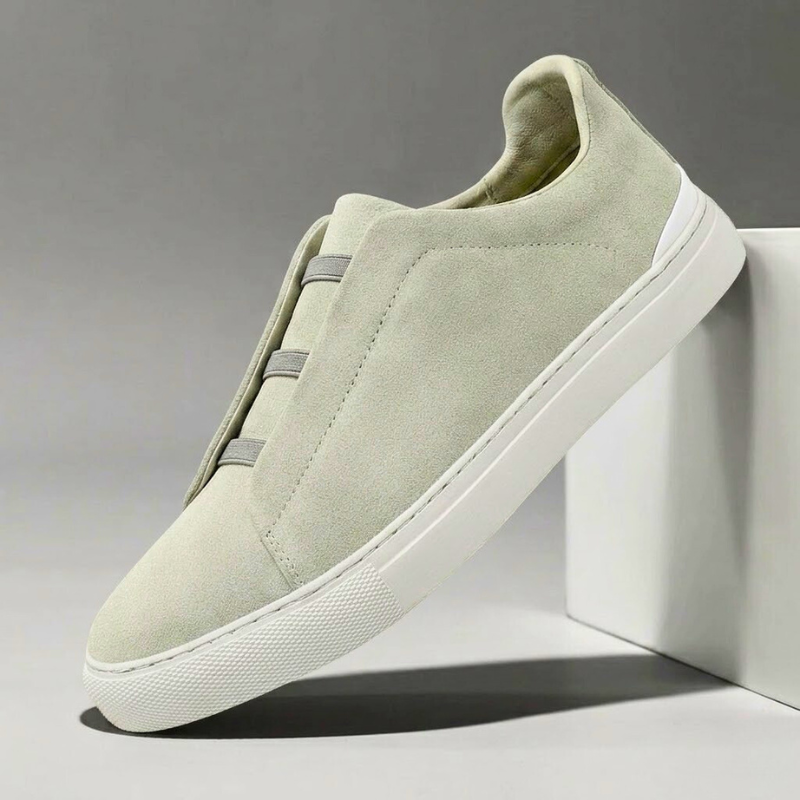 Black men's Chelsea style slip-on sneakers. Modern, comfortable lifestyle footwear for fashion.