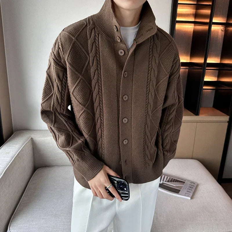 Men's chunky cable knit cardigan in a relaxed fit with button front, ideal for stylish all-season layering.