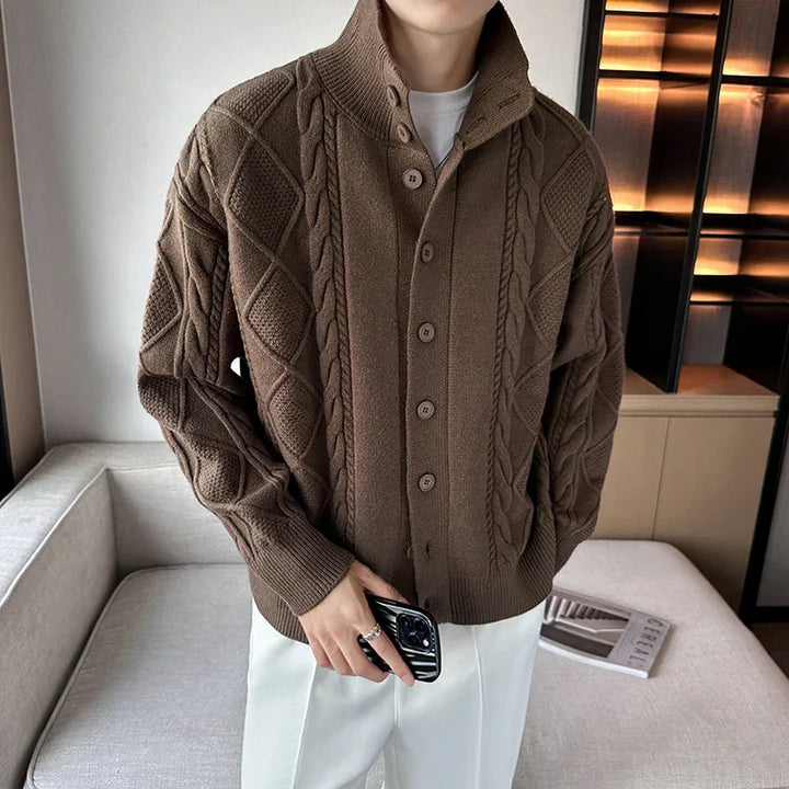 Men's chunky cable knit cardigan in a relaxed fit with button front, ideal for stylish all-season layering.