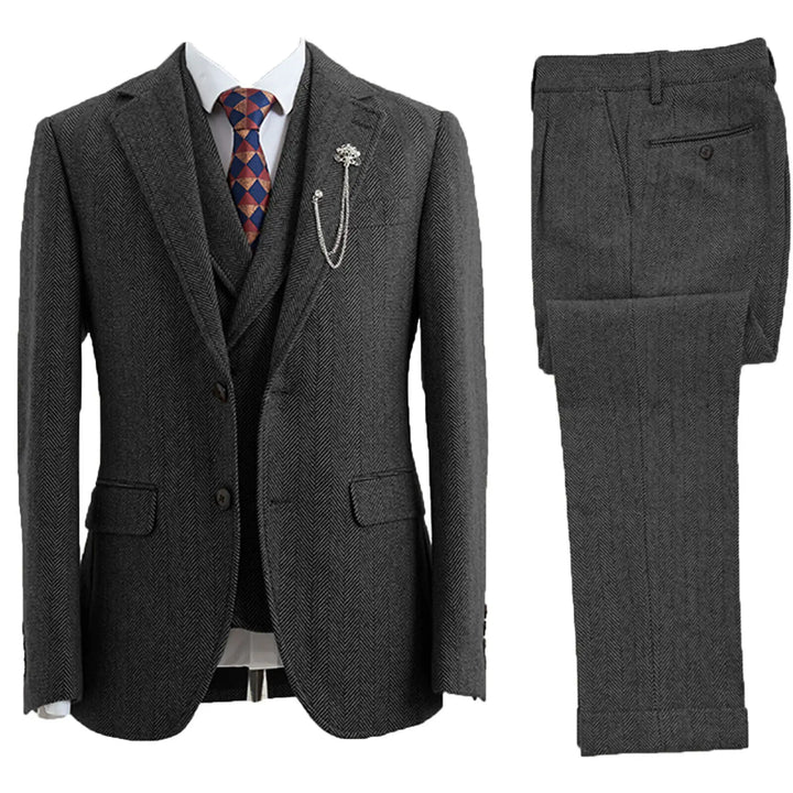 Men's classic 3-piece herringbone suit for formal occasions. Tailored business & wedding wear.