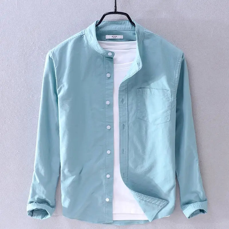 Men's classic band shirt offering all-day comfort. Relaxed fit, short sleeve button-up for versatile casual wear.