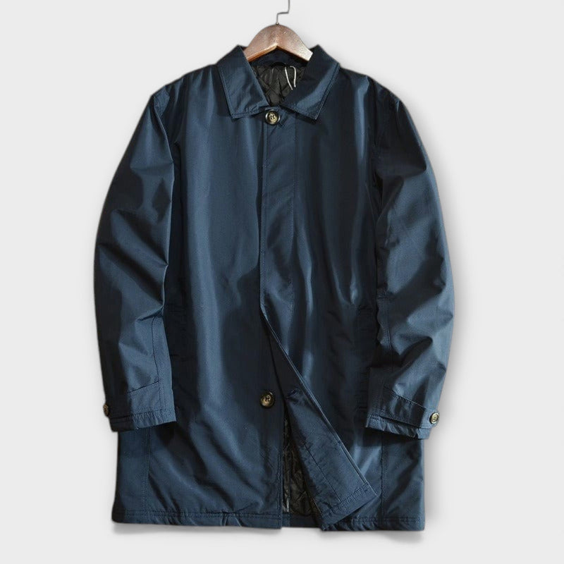 Sleek blue men's trench coat, a versatile overcoat for business casual and classic men's outerwear fashion.