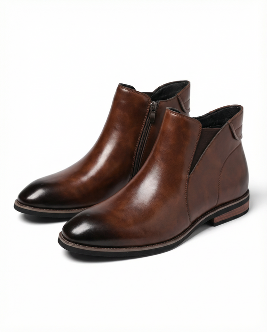 Men's classic black leather Chelsea boots with durable side-zip closure, perfect for casual or formal wear.