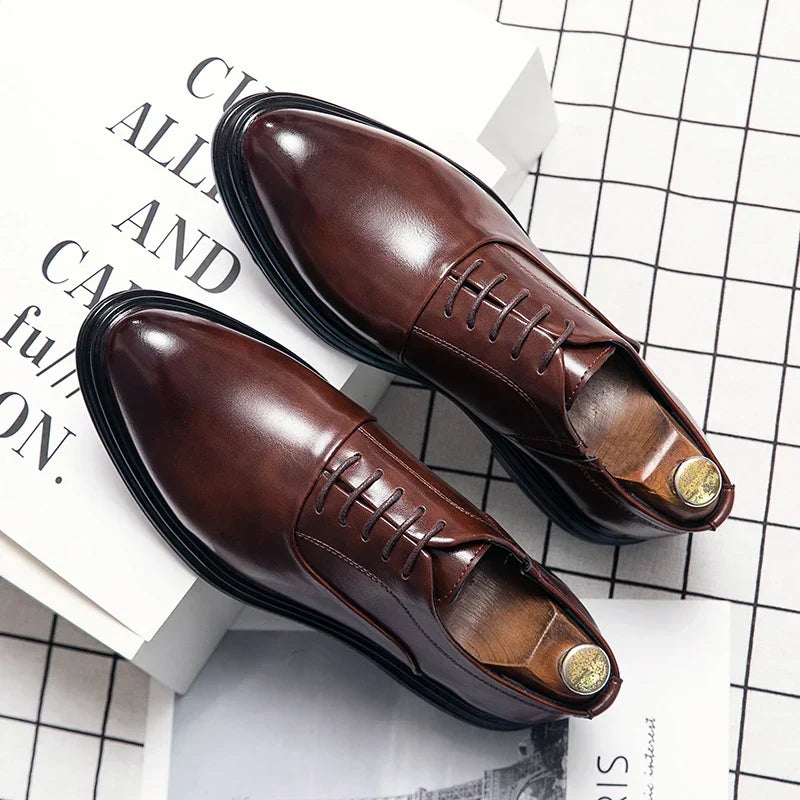 Men's classic black leather formal dress shoes for business, wedding, or office wear, offering a sophisticated look.