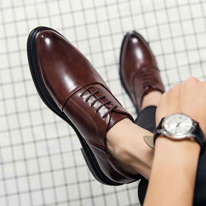Elegant men's classic brown leather dress shoes, perfect for business meetings, weddings, or formal office attire.