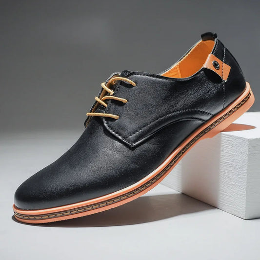 Men's classic black leather lace-up dress shoes, perfect for formal and business occasions.