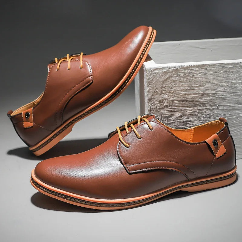 Versatile men's classic leather lace-up shoes in a deep blue, suitable for both dressy and smart casual outfits.