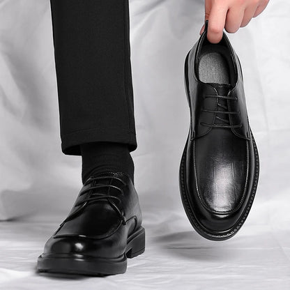 Men's classic black leather lace-up oxford dress shoes for formal events and office attire.