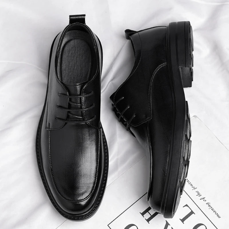 Stylish brown leather lace-up oxford dress shoes, ideal for men's professional and formal fashion.
