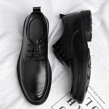 Stylish brown leather lace-up oxford dress shoes, ideal for men's professional and formal fashion.