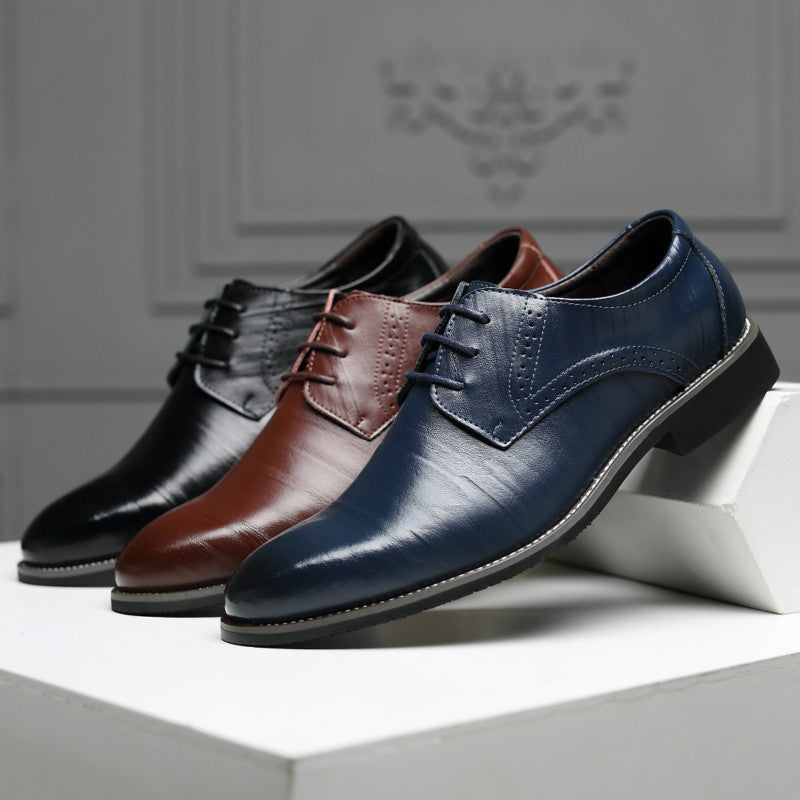 Top-down view of men's sleek black Oxford dress shoes, classic formal footwear for men.