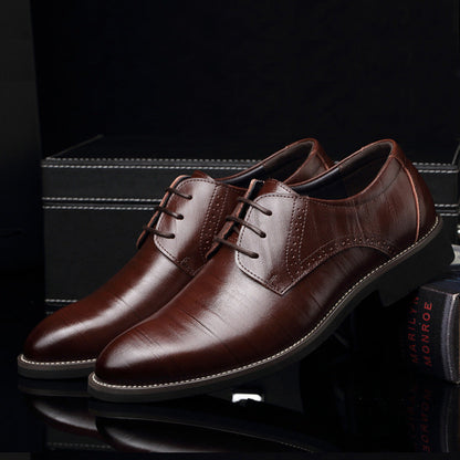 A pair of men's elegant black Oxford dress shoes, ready for any formal occasion or business meeting.