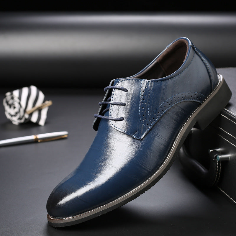 Sleek side profile of men's black leather Oxfords, ideal for elegant business and formal events.