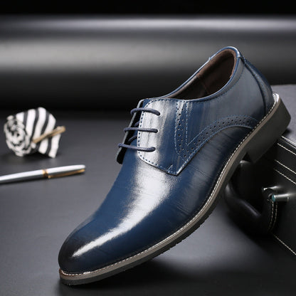Sleek side profile of men's black leather Oxfords, ideal for elegant business and formal events.