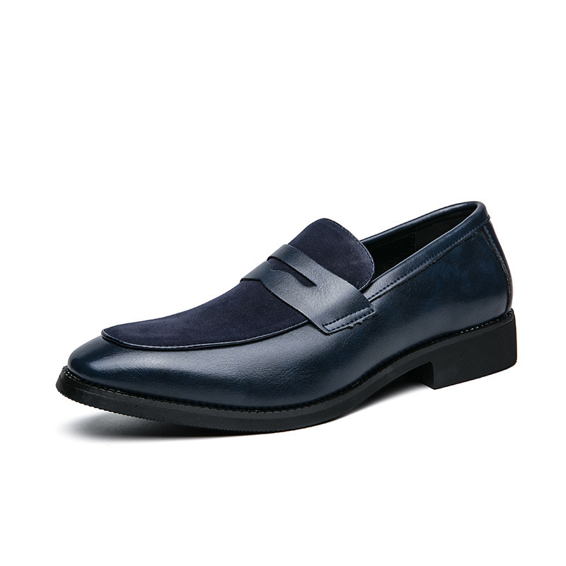 Distinguished navy men's penny loafers. Comfortable slip-on dress shoes for a polished, professional or smart casual ensemble.