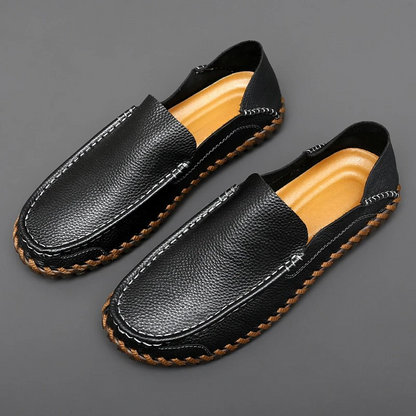 Premium black men's slip-on loafers, durable dress shoes for lasting comfort.