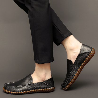 Men's classic brown slip-on loafers, stylish & comfortable casual-to-dress footwear.