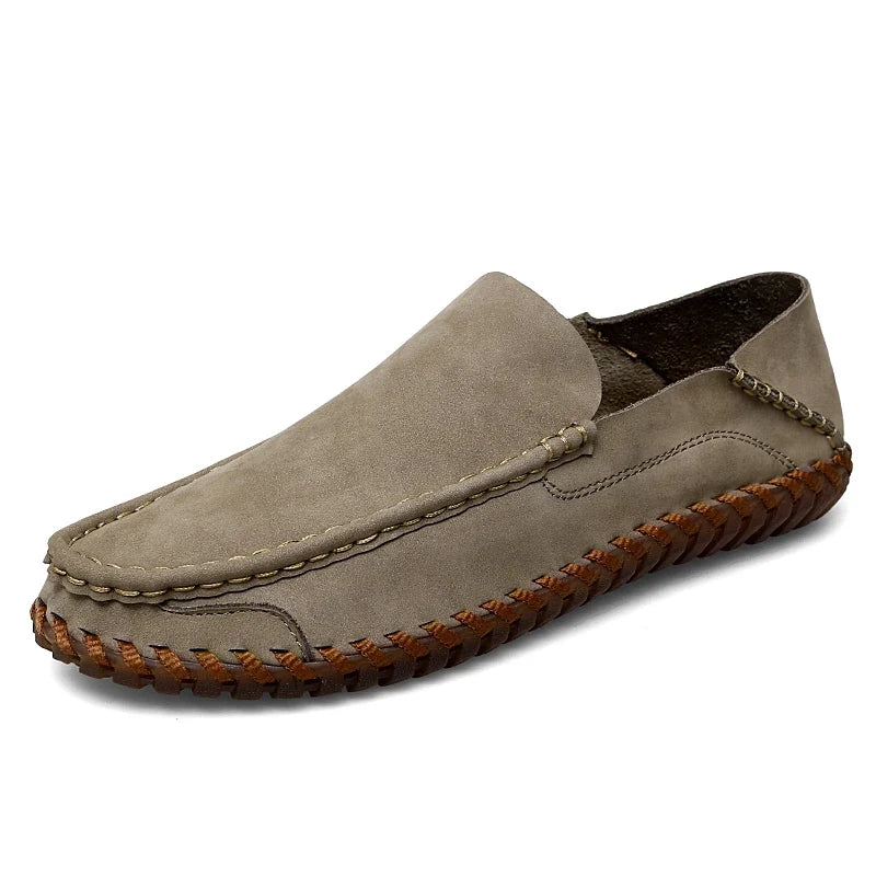 Elegant men's beige slip-on dress loafers, combining comfort with classic fashion.