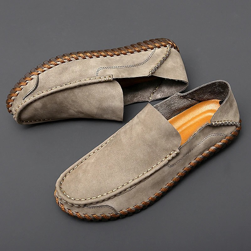 Comfortable men's brown slip-on loafers, versatile dress shoes for any outfit.