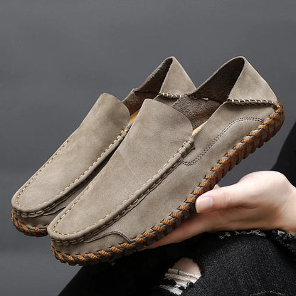 Stylish men's beige slip-on loafers, classic casual footwear for modern fashion.