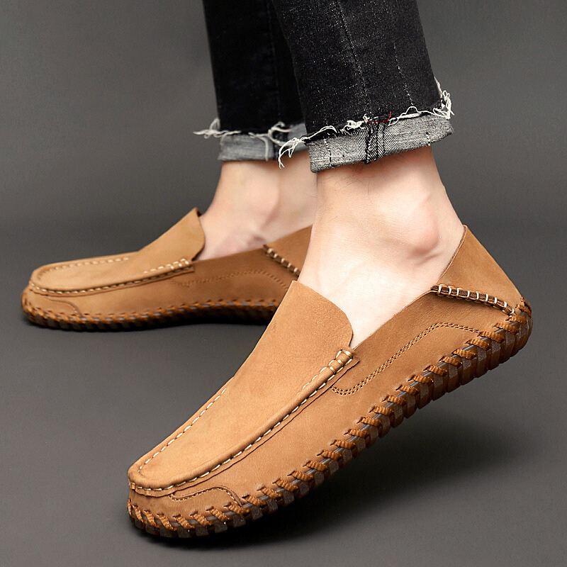 Men's elegant black slip-on dress loafers, essential for sophisticated everyday wear.