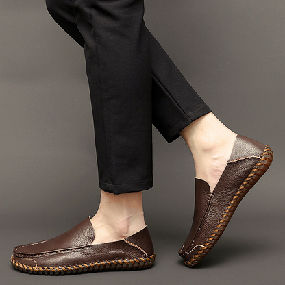 Fashionable men's beige slip-on shoes, classic loafers for versatile style.