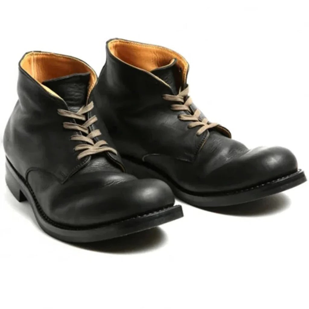 Men's classic black sustainable comfort boots, slip-on style for versatile casual & work wear.