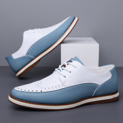 Pair of men's classic blue brogue shoes, ready for a formal event or smart casual outing, with comfort.