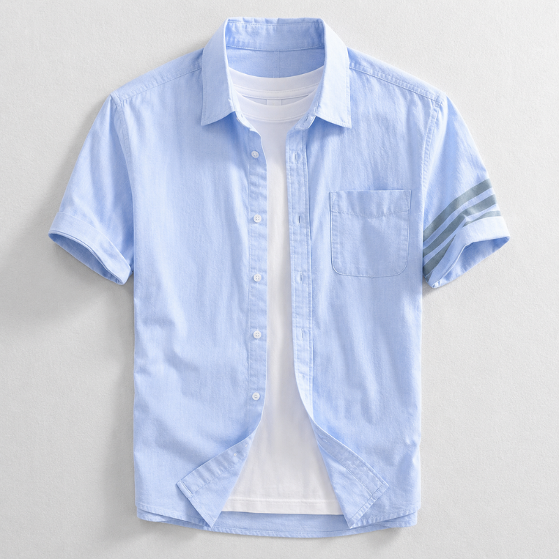 Men's classic blue Oxford shirt, tailored fit for smart casual and everyday comfort. Long sleeve button down style.