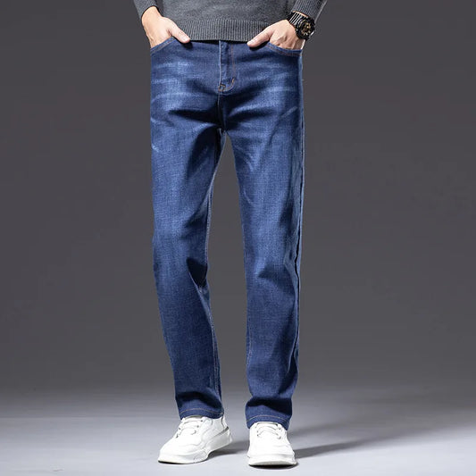 Men's classic blue stretch denim jeans, comfort fit, wrinkle resistant cotton blend for casual wear.
