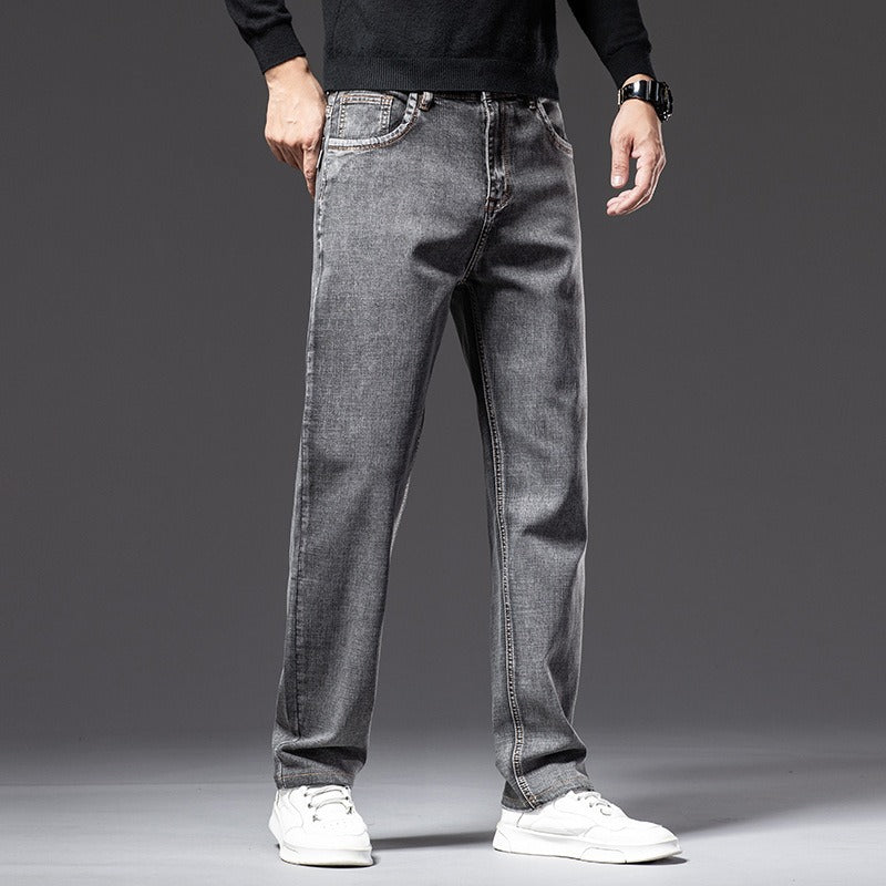Wrinkle resistant men's stretch denim jeans, cotton blend, ultimate comfort fit in a timeless blue.