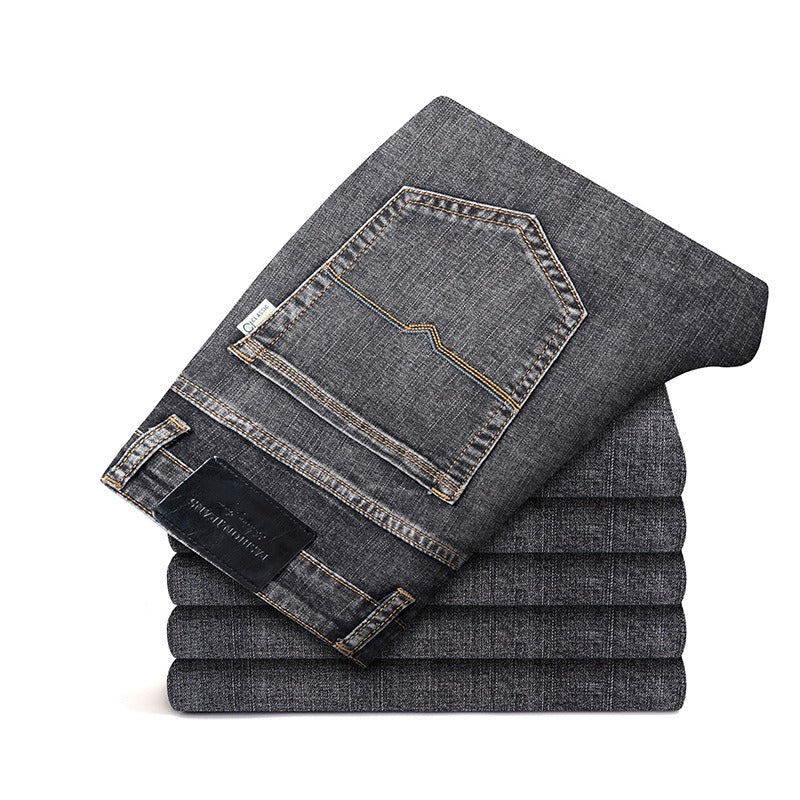 Men's apparel: Classic blue stretch denim jeans, comfort fit, wrinkle resistant for versatile style.