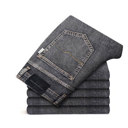 Men's apparel: Classic blue stretch denim jeans, comfort fit, wrinkle resistant for versatile style.