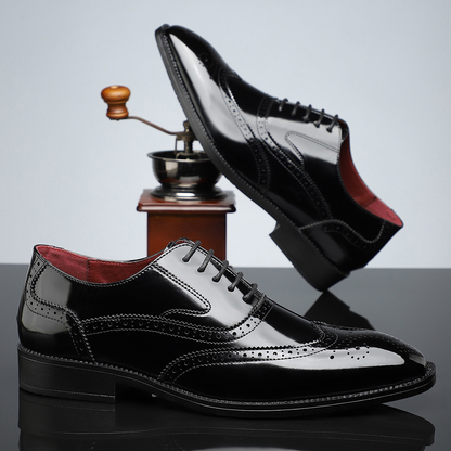 Polished men's dress shoes, classic brogue wingtip, sophisticated for formal attire and office elegance & comfort.