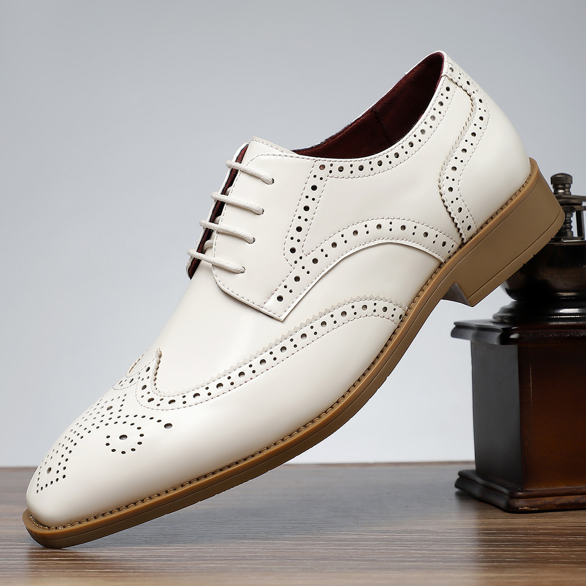 Durable men's classic brogue dress shoes, polished leather, wingtip, built for sophisticated style, comfort.