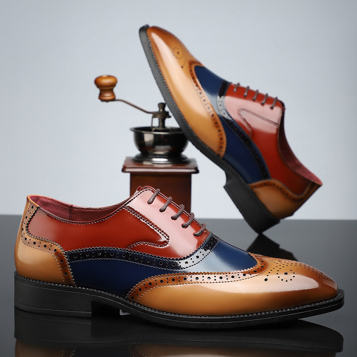 Classic men's brogue wingtip dress shoes in polished leather for sophisticated formal occasions and office wear.
