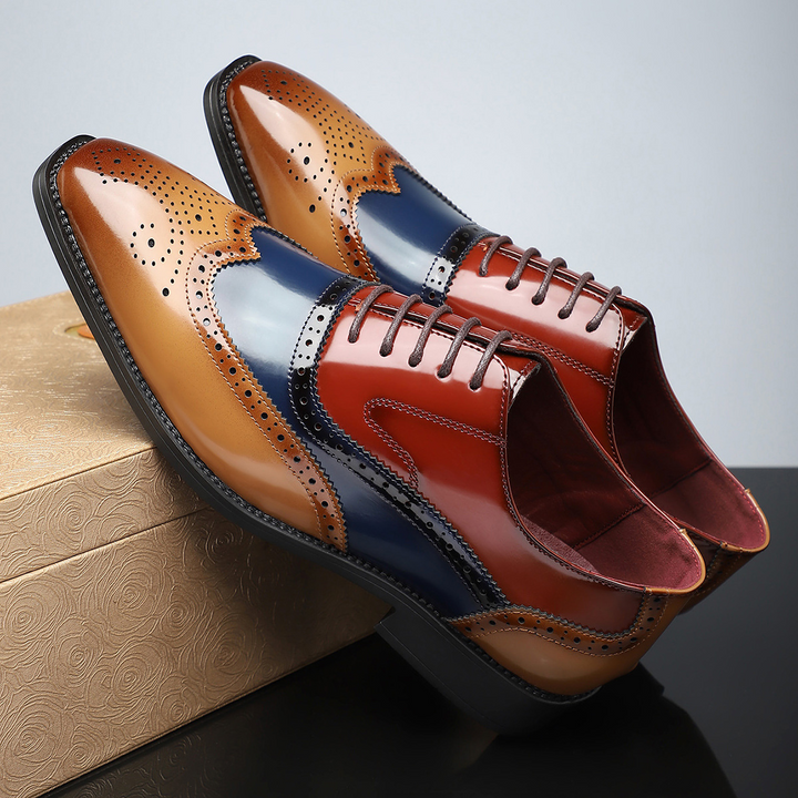 Polished leather men's classic brogue dress shoes, wingtip, offering elegant and sophisticated style for formal settings.
