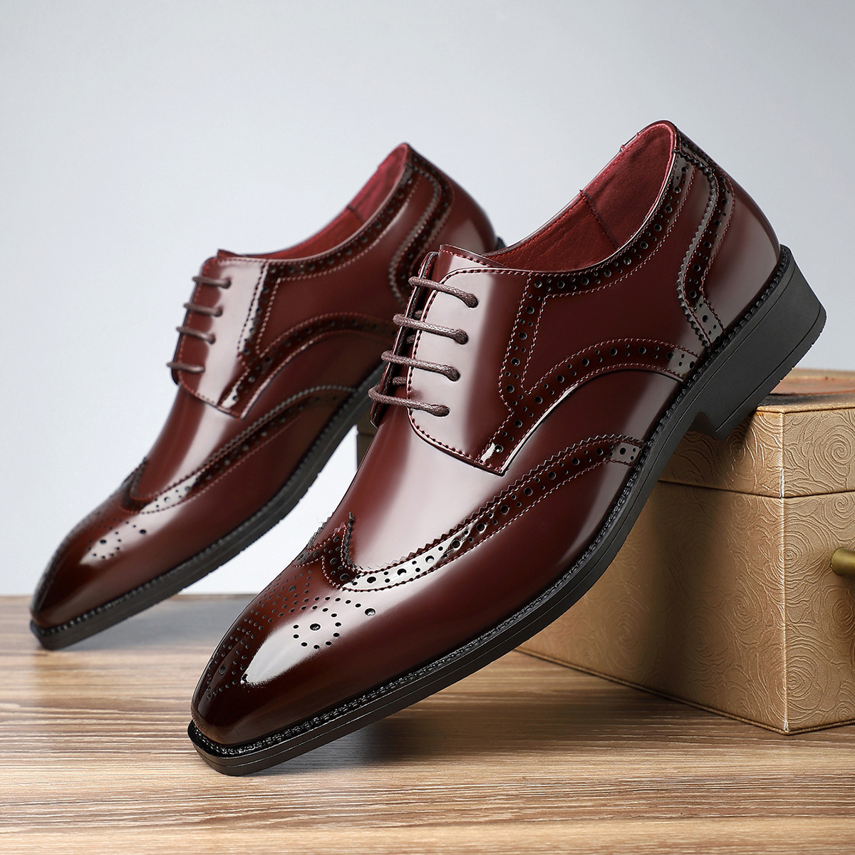 Formal men's brogue dress shoes, classic wingtip design, ideal for office, events, and sophisticated comfort.