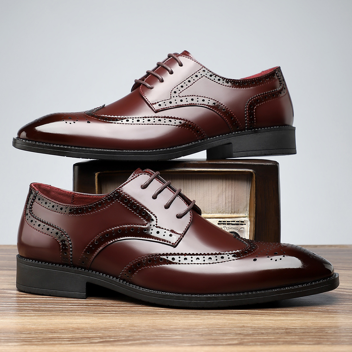 Men's classic wingtip brogue dress shoes in polished leather, perfect for formal and office sophistication & comfort.