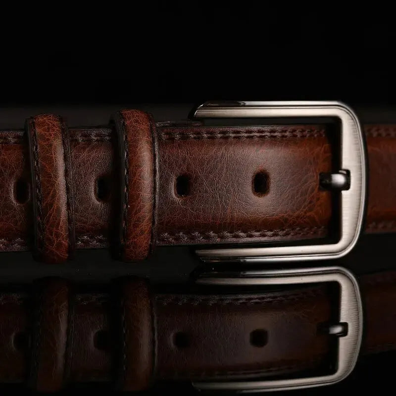 Durable men's full-grain leather belt in versatile brown. Classic style accessory for long-lasting wear.