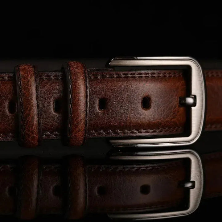 Durable men's full-grain leather belt in versatile brown. Classic style accessory for long-lasting wear.