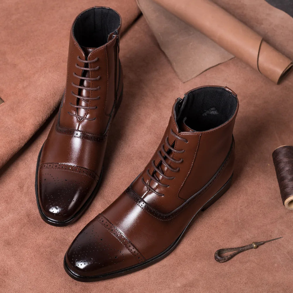 Tan leather men's brogue dress boots, showcasing intricate perforations and a polished finish for business attire.
