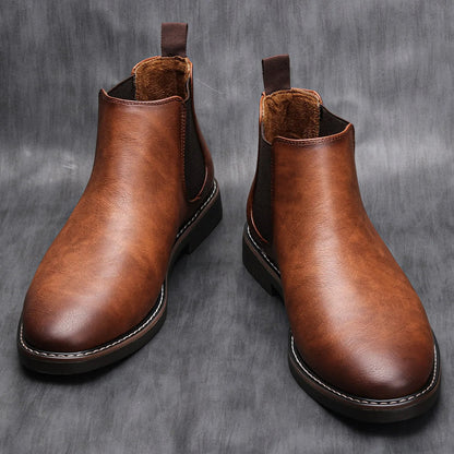 Elegant men's dress Chelsea boots in polished leather, suitable for formal occasions.